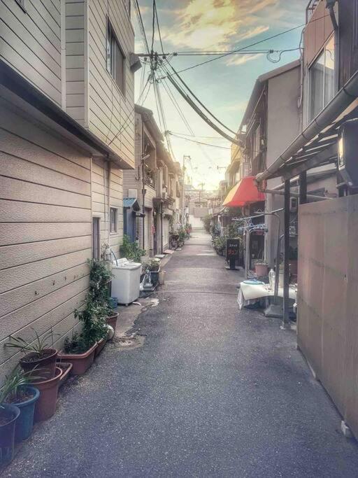 อพาร์ทเม้น 旅家 Kanzakigawa โอซาก้า